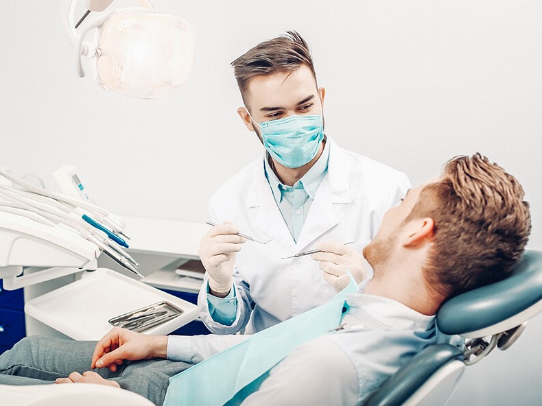 dentist treating a patient at avant dental clinic kolkata